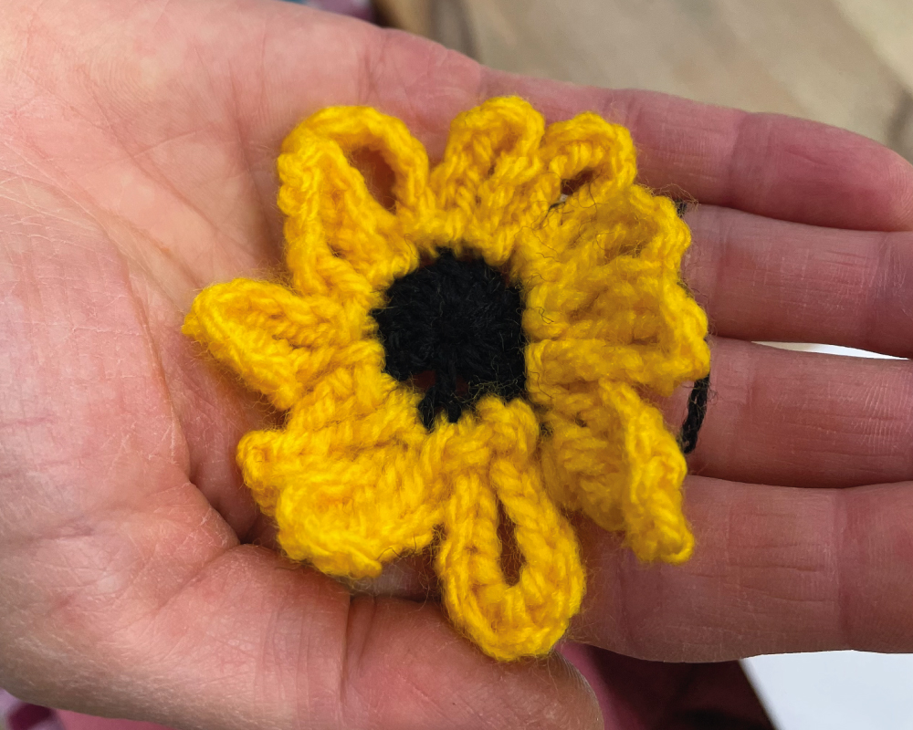 A crochet sunflower produced for the Hidden Disabilities Sunflower project at Fearon Hall
