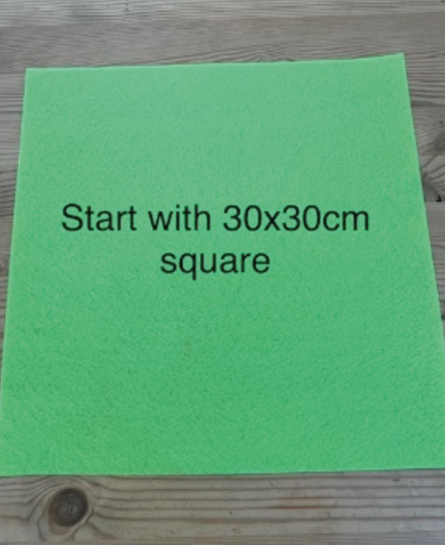 An image of a 30cm green felt square