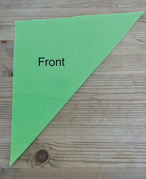 An image of a felt triangle with the word Front written on it